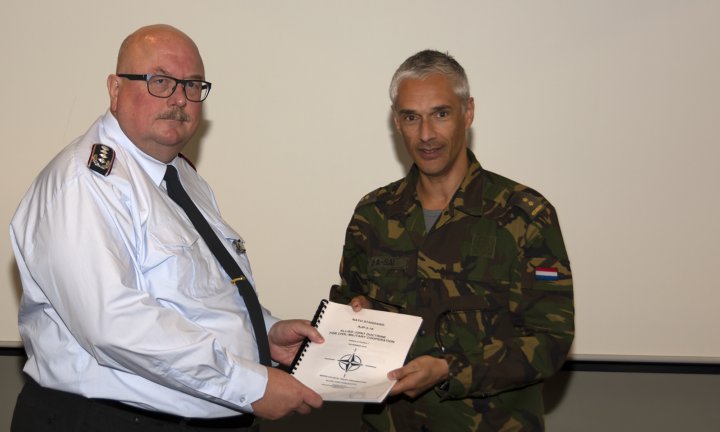 Allied Joint Publication for civil-military cooperation handed over to the Director CCOE