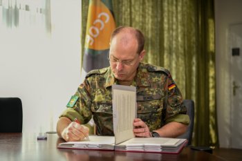 The Director CCOE, Col Eckel signed the Contract between HSU and CCOE reaccreditation MCMI